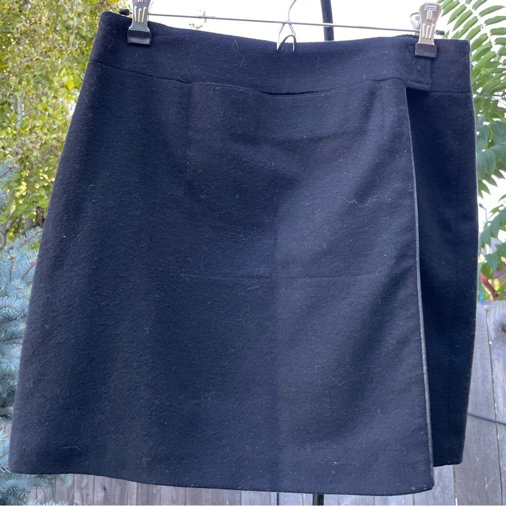 MNG black wool suit skirt bottom in size 8.